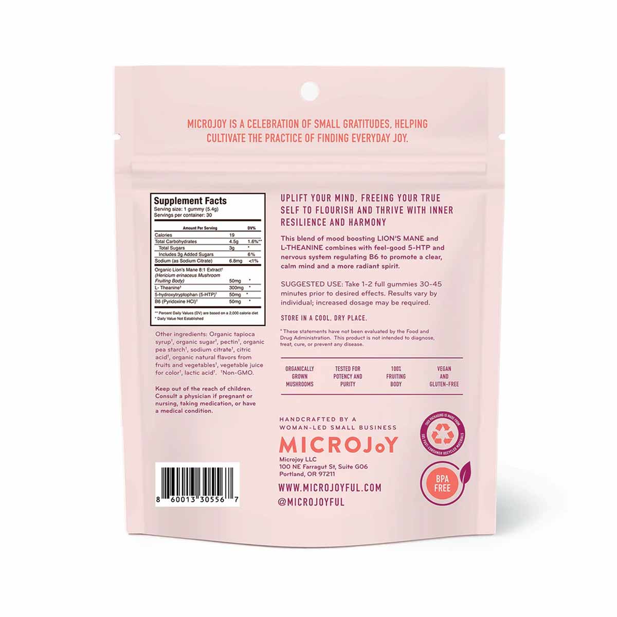 Pink pouch of Elevate Gummies by MicroJoy with supplement facts label, ingredients list, and product information visible on b