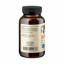 Brown glass bottle with black screw cap containing GI Balance capsules by Wise Woman Herbals, label visible with usage instru
