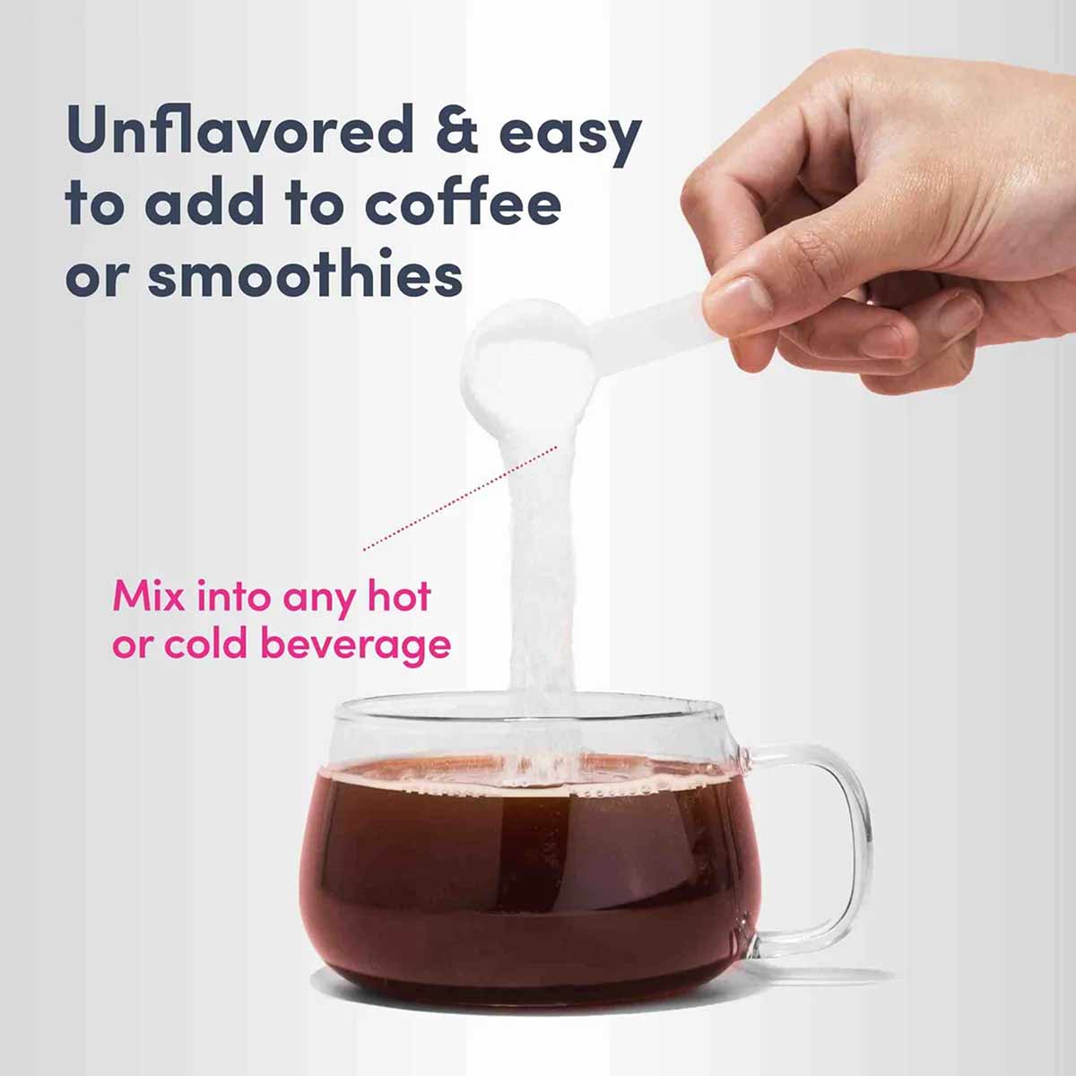 Hand holding white scoop pouring collagen powder into mug of dark coffee.
