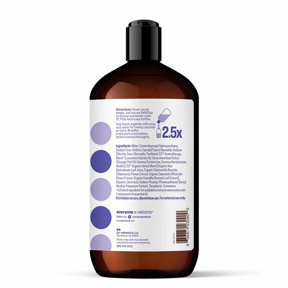 Brown glass bottle with black pump top containing purple-labeled hand soap with ingredient list and product directions visibl