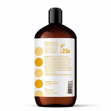 Amber glass bottle of hand soap with black pump cap and white label featuring yellow circles and product information.