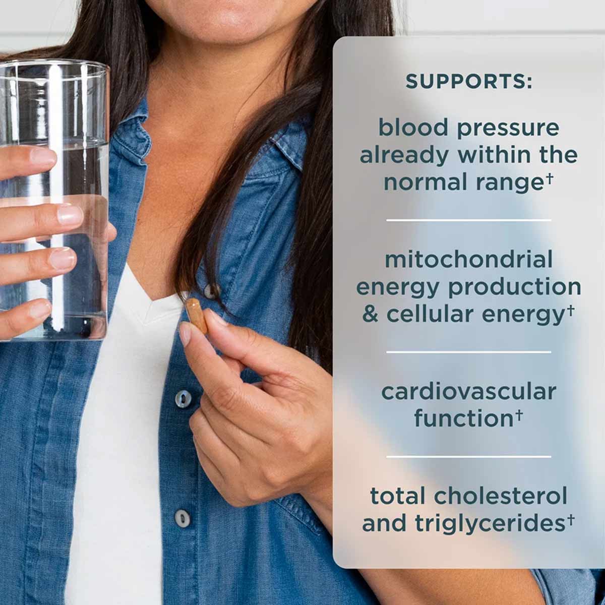 Woman in denim shirt holding glass of water with product information card listing cardiovascular health benefits.