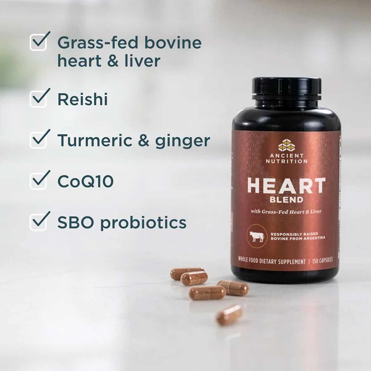 Heart Blend supplement bottle with brown capsules and ingredient checklist including grass-fed bovine heart and liver, reishi