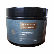 Dark glass jar with black lid containing Hemp Synergies-AX Gummies by Quicksilver Scientific, labeled as a calming formula di