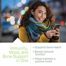 Woman wearing yellow jacket and teal scarf holding smartphone with white earbuds, with product benefits text below.