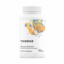 White dietary supplement bottle labeled Thorne Immune Activator with blue and gold abstract design, containing 30 capsules.