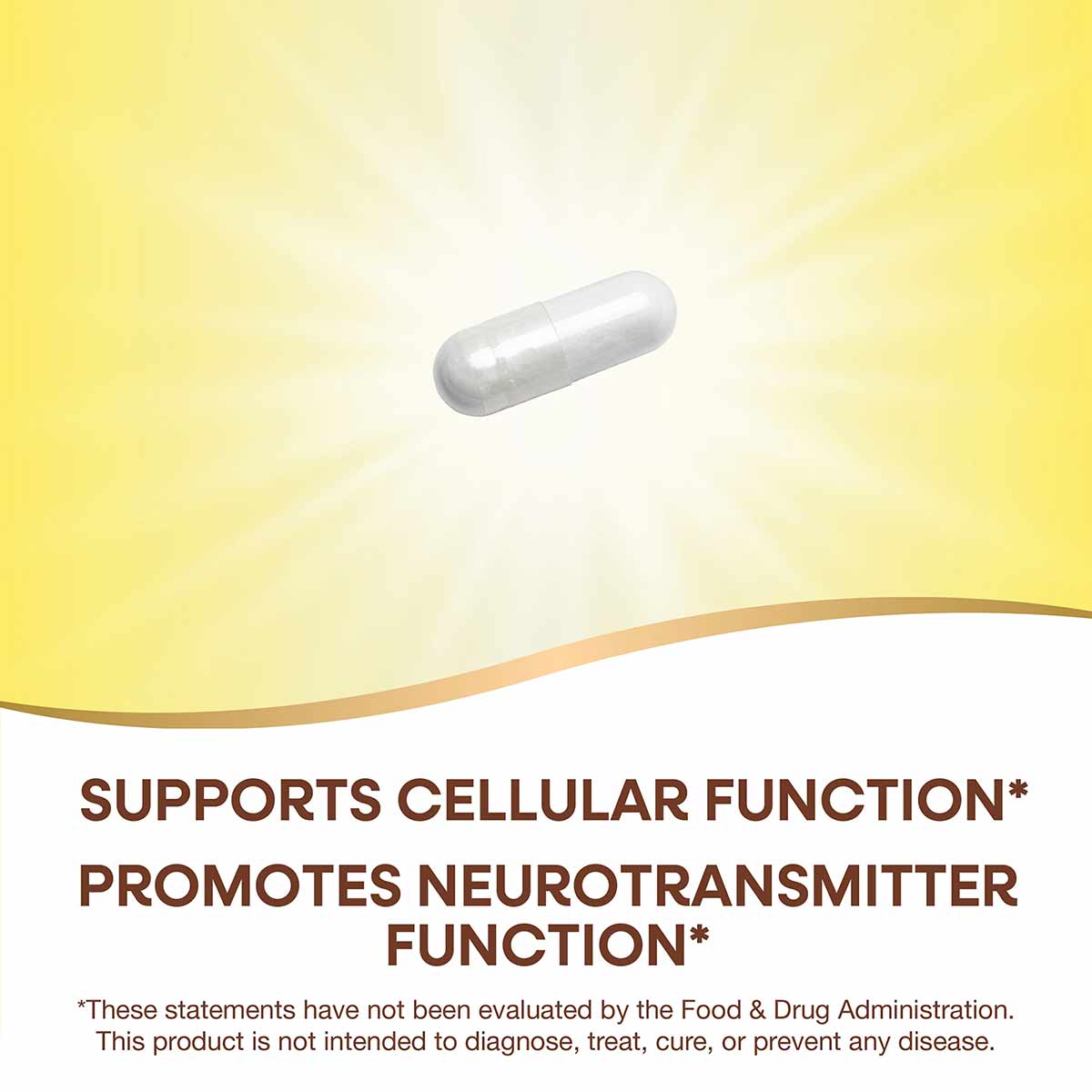 White capsule supplement pill on yellow and white background.