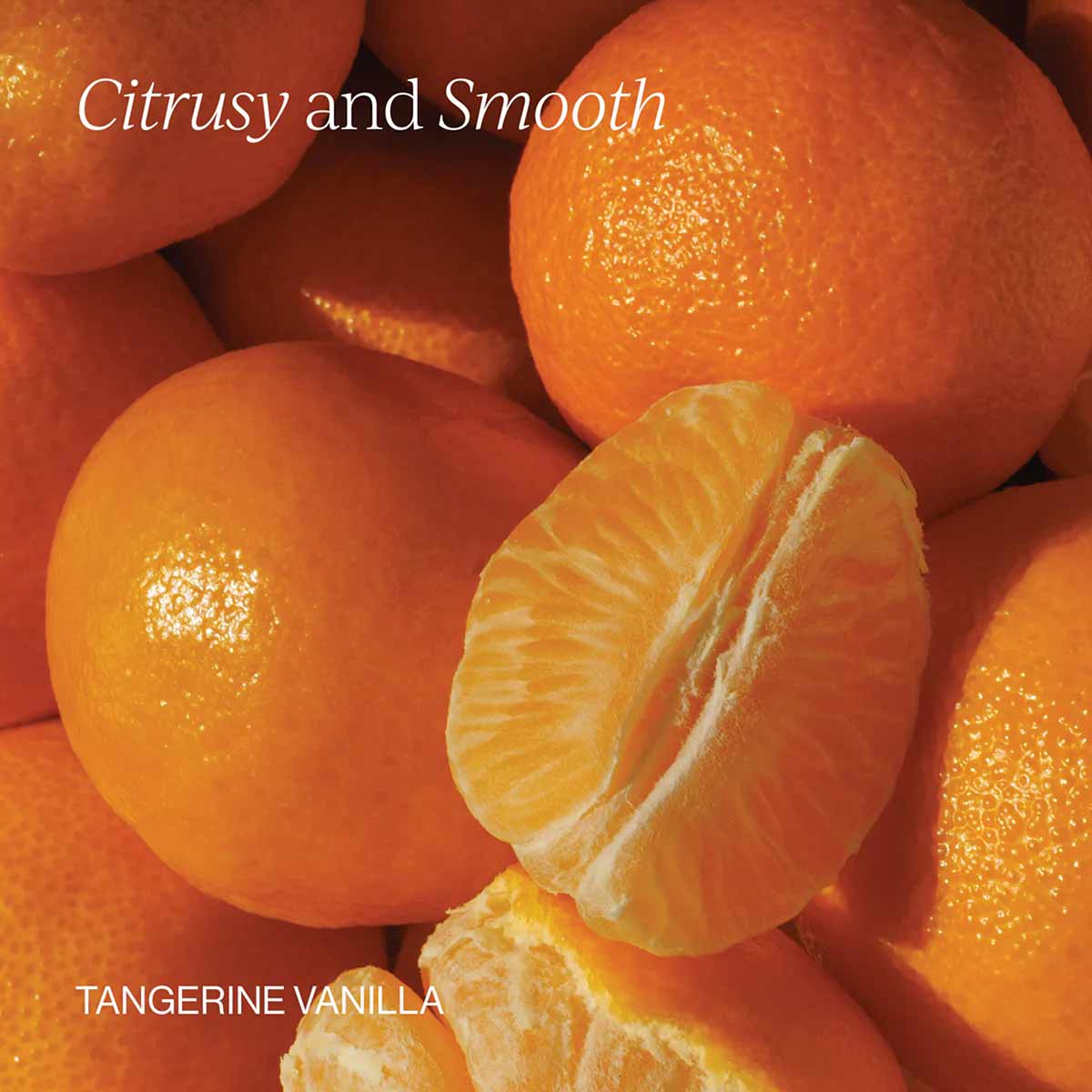 Fresh tangerines with one peeled segment, text reads "Citrusy and Smooth" and "Tangerine Vanilla."