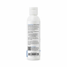 White bottle of Seeking Health Liposomal Vitamin C liquid supplement with white cap and product information label.