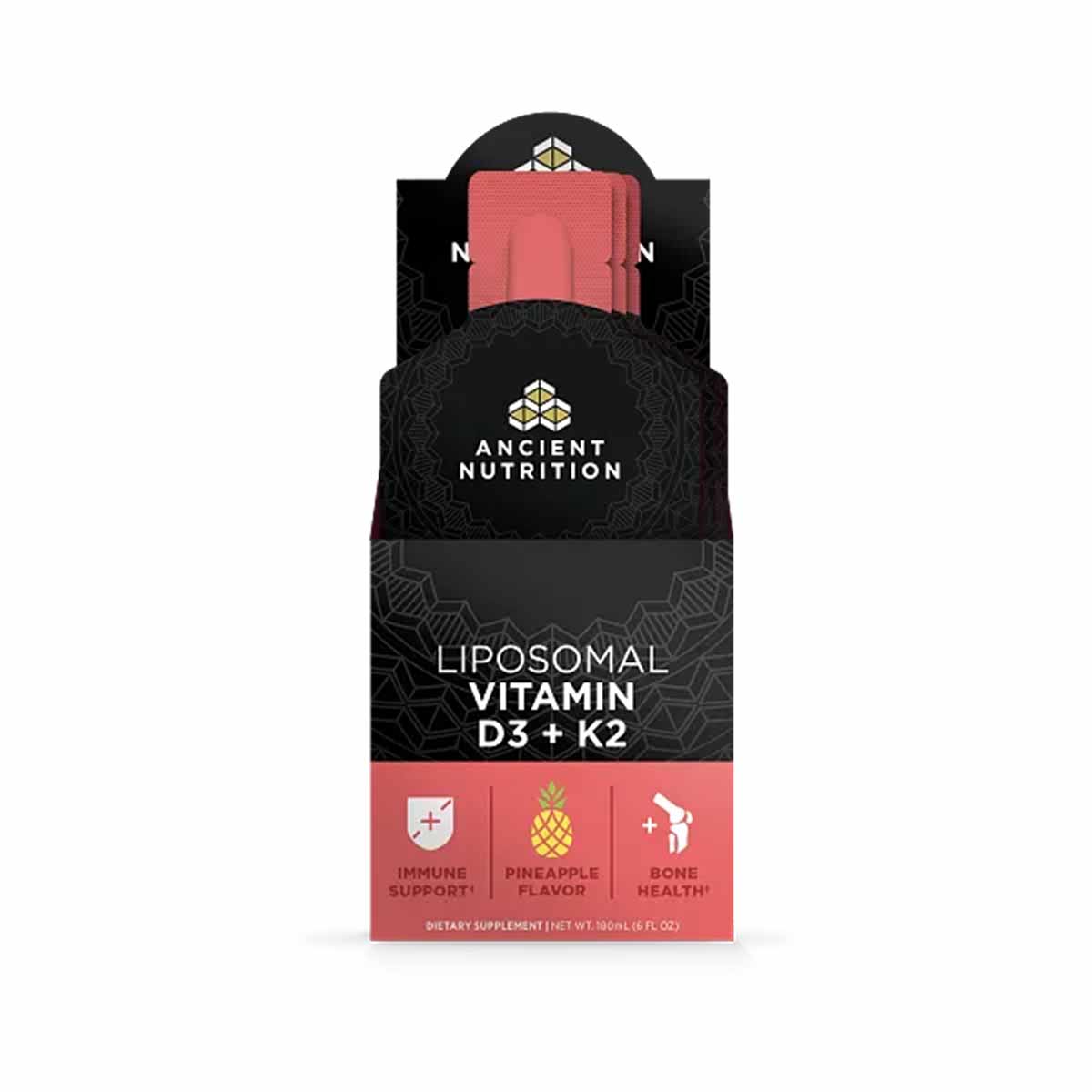 Ancient Nutrition Liposomal Vitamin D3 + K2 gel pack box with red packet visible, pineapple flavor.