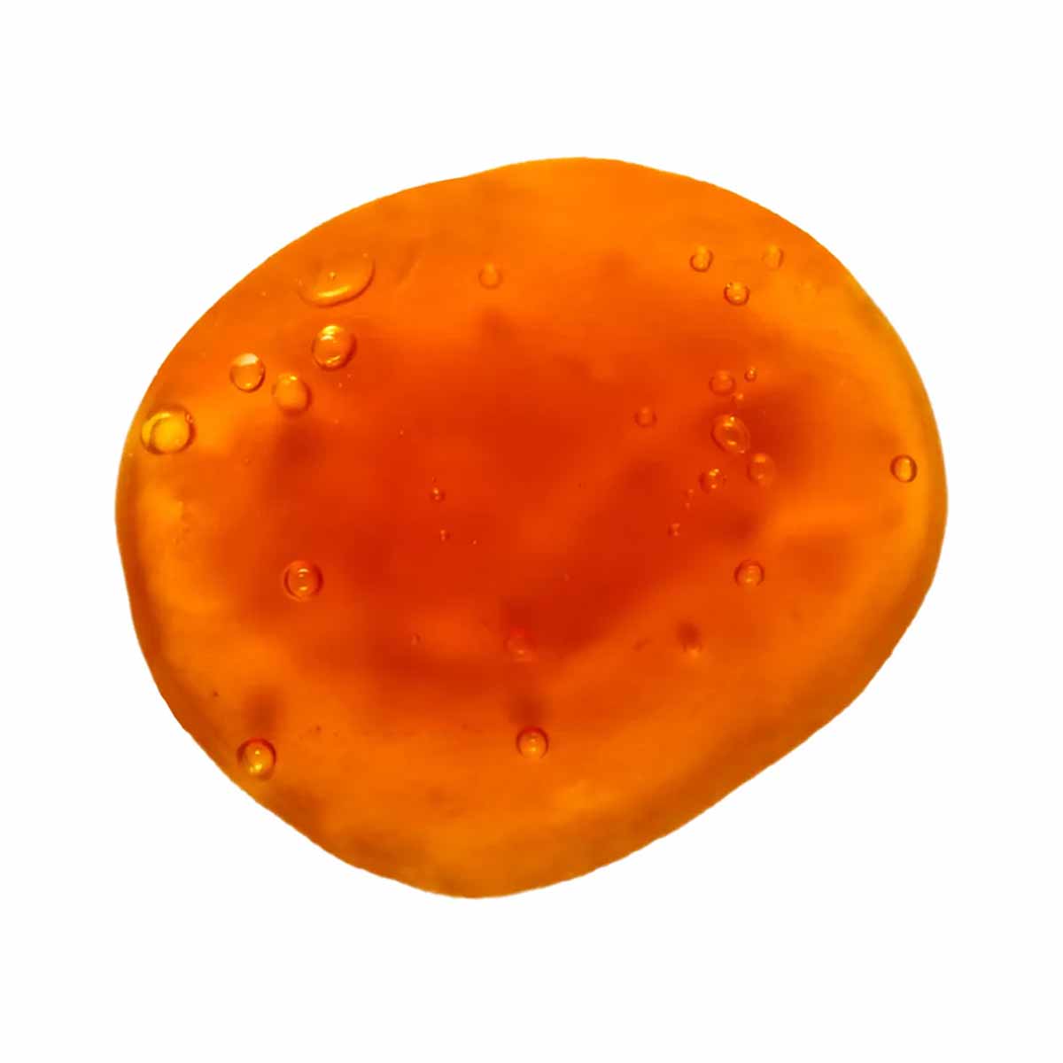 Orange spherical gel capsule with visible bubbles on surface.
