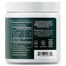 White jar with green label showing supplement facts, vegan and gluten-free certifications for organic maca powder.