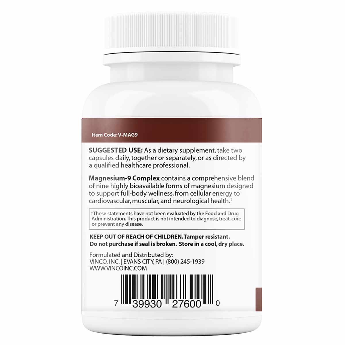White supplement bottle with ribbed cap, brown label band, and barcode displaying Magnesium-9 Complex product information.