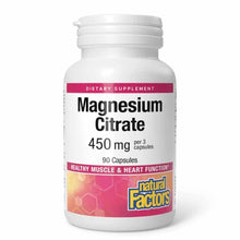 White bottle of Magnesium Citrate 450mg dietary supplement with pink label, containing 90 capsules by Natural Factors.