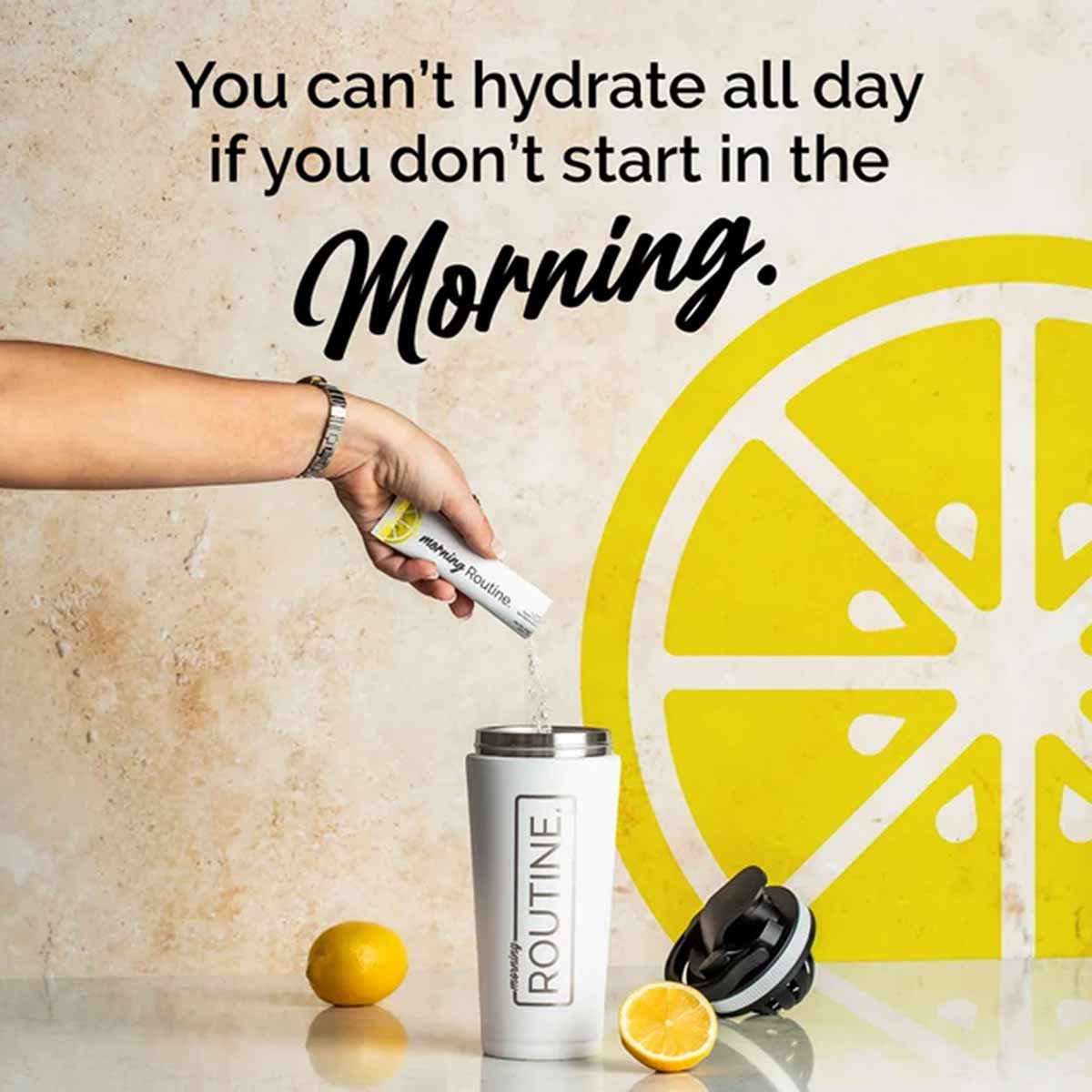 Hand holding lip balm above white Routine bottle with lemon slices and yellow lemon graphic on textured background.