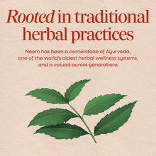 Neem leaf branch with multiple green leaflets on a beige background with red text about traditional herbal practices.