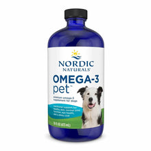 Nordic Naturals Omega-3 Pet liquid supplement in blue glass bottle with black cap and white label featuring dog image.