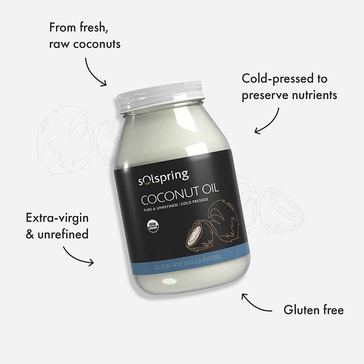 Glass jar of Solspring coconut oil with black label, white cream-colored oil inside, and metal screw-top lid.