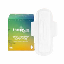 A green and yellow gradient box of Hempress organic cover super pads stands beside a single white winged pad.