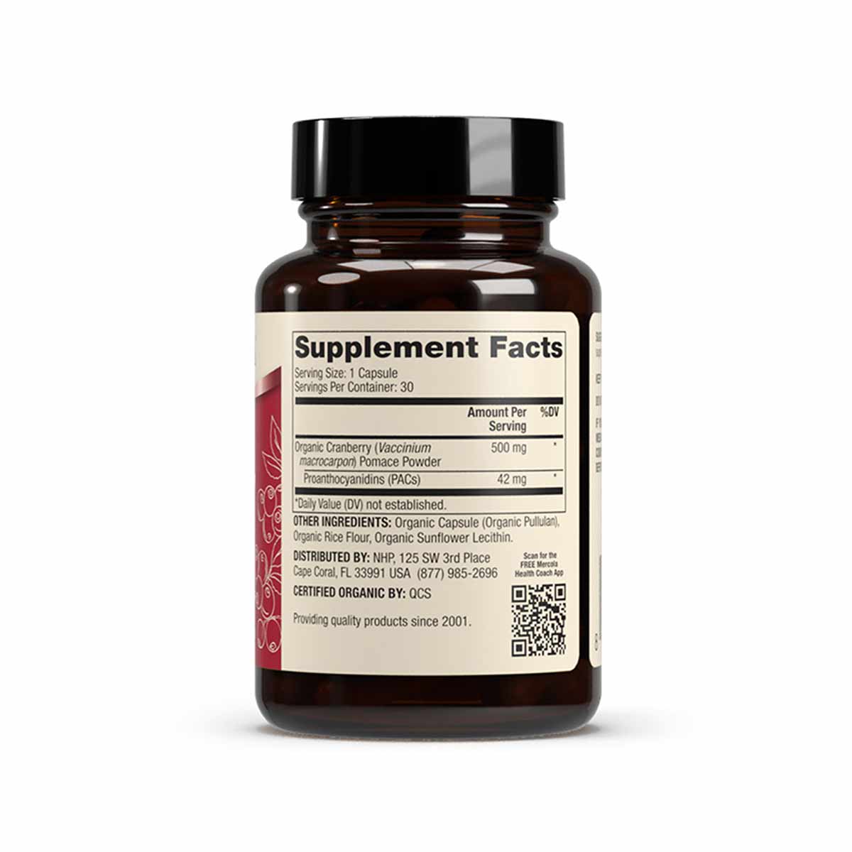 Dark amber glass bottle with black cap containing organic cranberry supplement capsules and supplement facts label.
