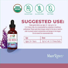 Dark red liquid dropper bottle with black cap labeled "Organic Sea Moss" next to purple sea moss plant, with USDA Organic and