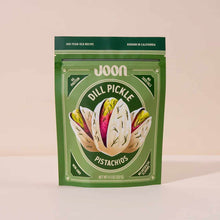 Joon dill pickle pistachios in green pouch with illustrated pistachio shell design, 4.5 oz package.