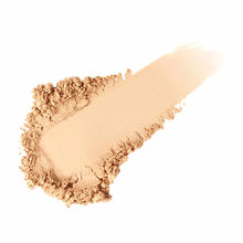 Beige powder sunscreen with crumbled and swatched texture showing light to medium coverage.