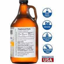 Amber glass bottle with black cap containing silver supplement liquid, with supplement facts label and certification badges f