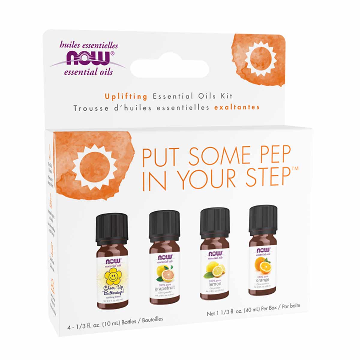 Four amber glass bottles of NOW Foods essential oils with black caps labeled Lemon, Grapefruit, and Orange in a white cardboa