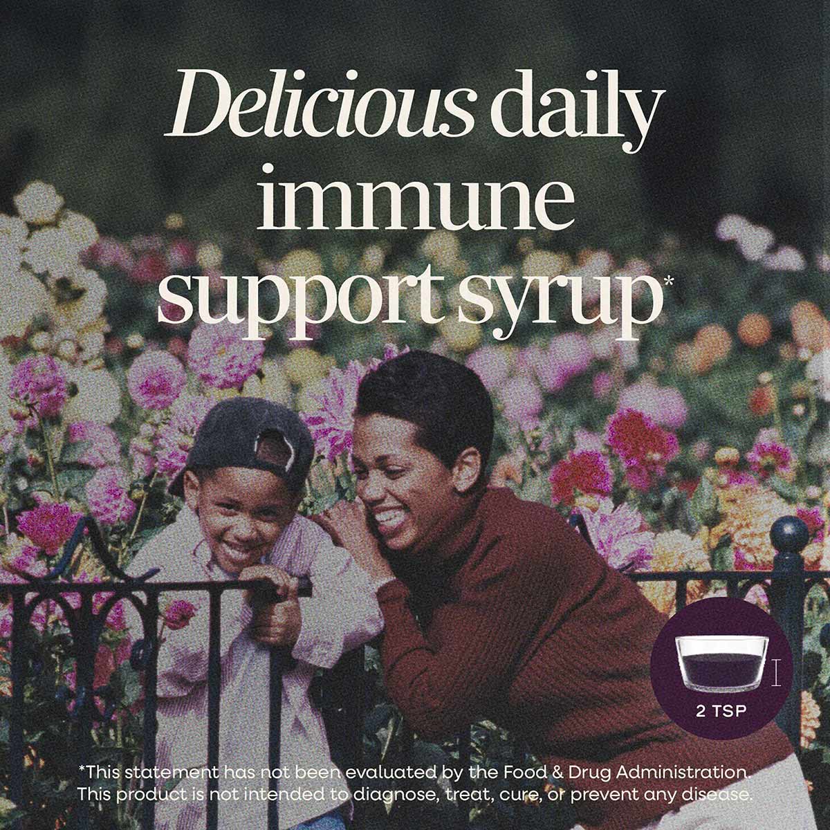 Dark purple elderberry syrup bottle with "2 TSP" serving size indicator and Nature's Way branding on label.