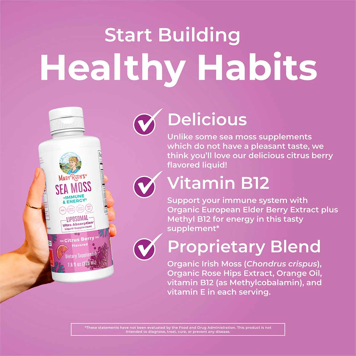 Hand holding MaryRuth's Sea Moss liposomal liquid supplement bottle with white cap on pink background.
