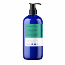 Cobalt blue pump bottle of shower gel with green and white label containing product information and ingredient details.