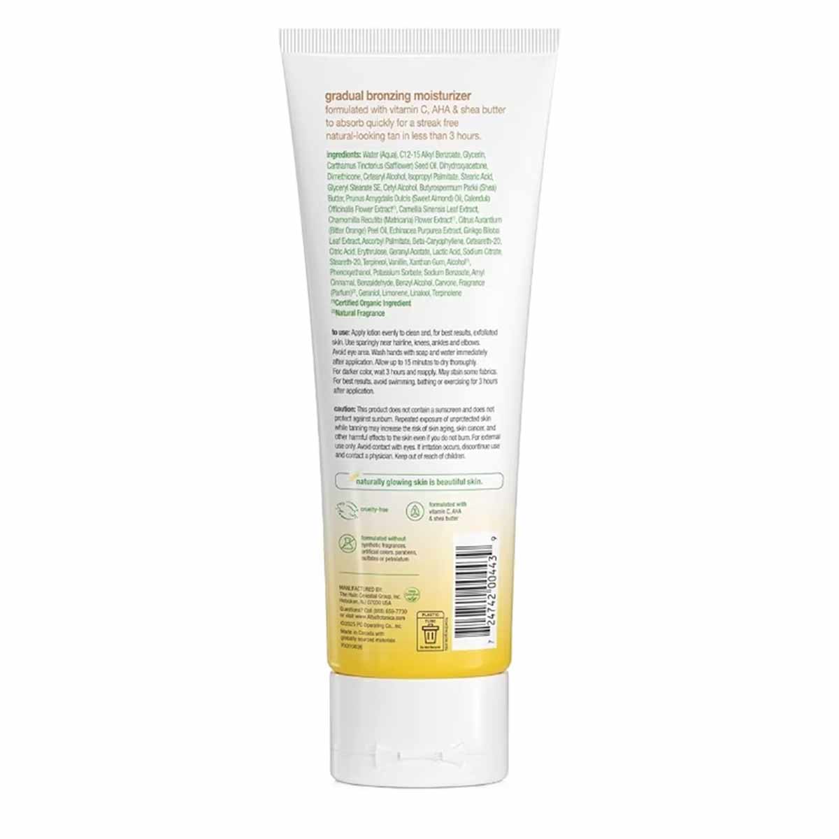 White and yellow tube of Alba Botanica gradual bronzing moisturizer with printed label and white cap.