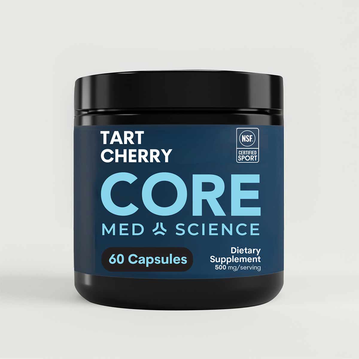 Black jar with blue label containing Tart Cherry capsules by Core Med Science, 60 capsules, 500 mg per serving.