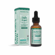 Charlotte's Web Daily Care CBD Extract Oil bottle with dropper and mint chocolate flavor packaging box.