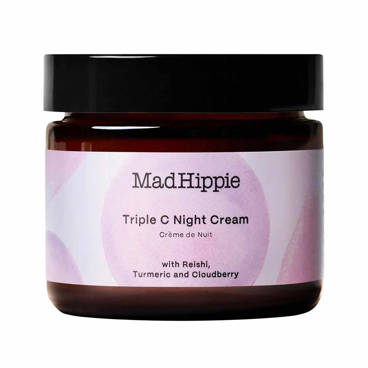 Brown glass jar with black lid and pink label reading "Mad Hippie Triple C Night Cream with Reishi, Turmeric and Cloudberry."