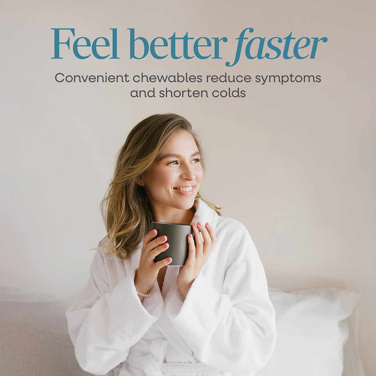Woman in white shirt holding dark mug with text about Umcka ColdCare chewable cold remedy.