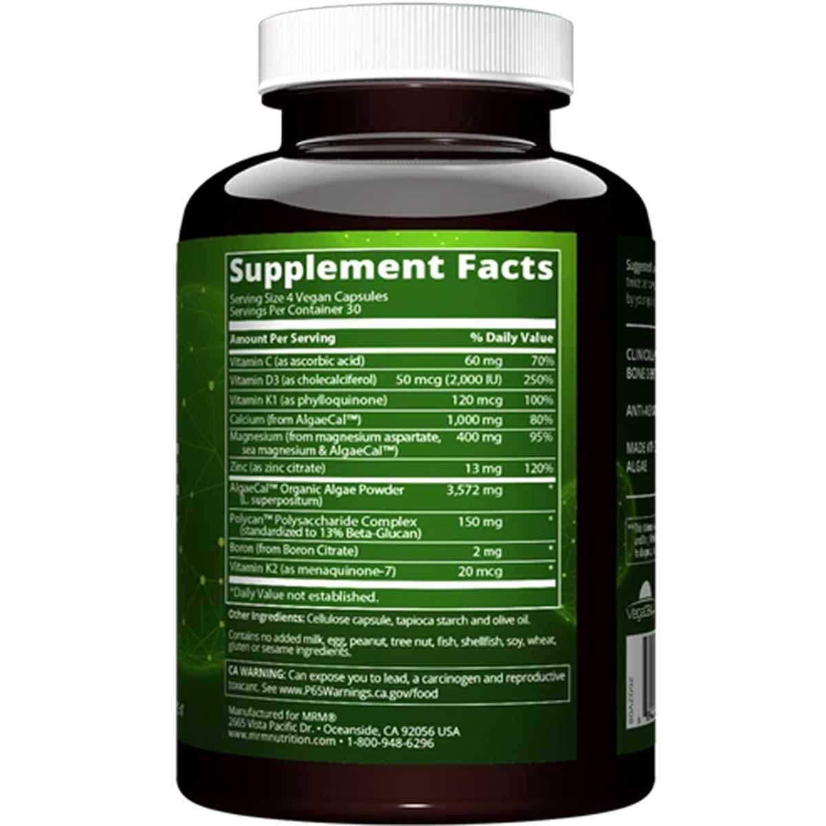 Black bottle with white cap and green supplement facts label displaying nutritional information and ingredients for vegan cap