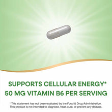 Gray cylindrical vitamin capsule against a green radiant background.