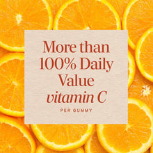 Sliced orange halves surrounding a cream-colored label stating "More than 100% Daily Value vitamin C per gummy" in red text.