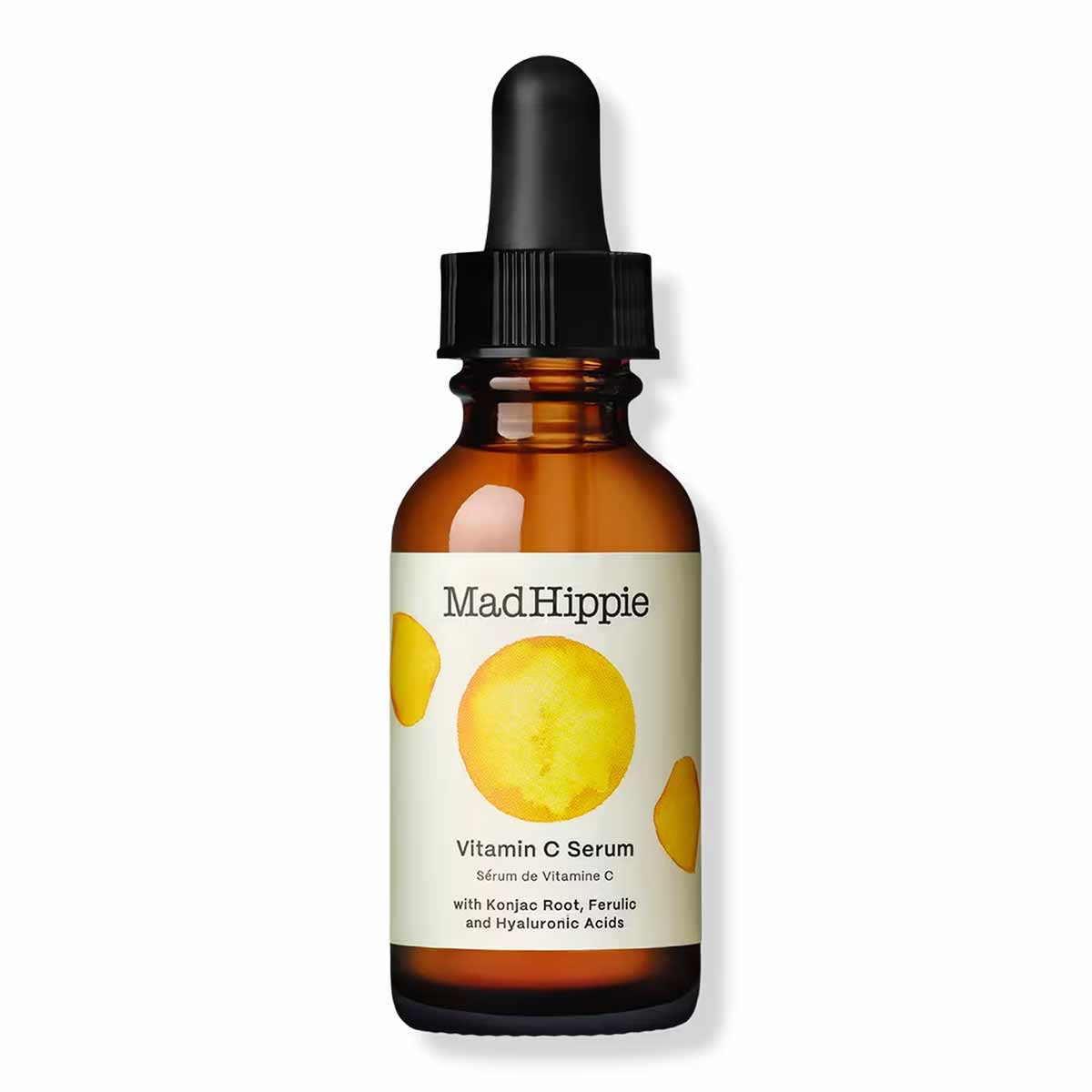 Mad Hippie Vitamin C Serum in amber glass bottle with black dropper cap and cream label featuring yellow citrus imagery.