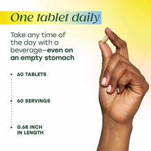 Hand holding a small beige tablet with text describing one daily dosage, 60 tablets, and 0.68 inch length against yellow back