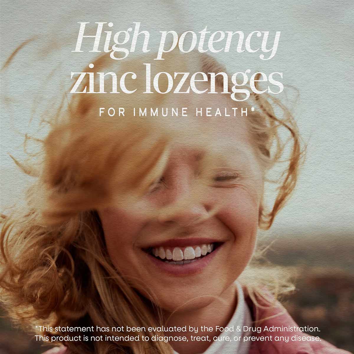 Bottle of Nature's Way zinc lozenges in wild berry flavor with product text on packaging.